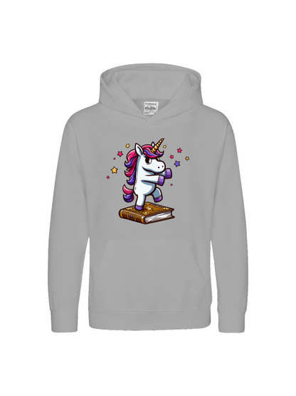 Unicornio bailando sobre un libro - Sudadera con capucha premium para niños SK